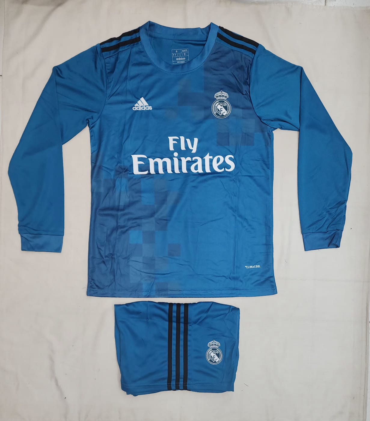 REAL MADRID FULL SLEEVES FAN VERSION WITH SHORTS